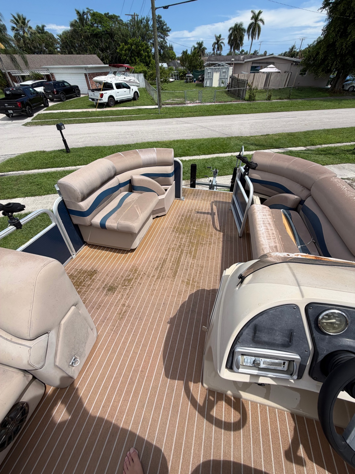 Same pontoon helm and deck after cleaning and restoration